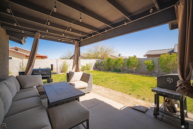 view of patio / terrace with outdoor lounge area and a fenced backyard