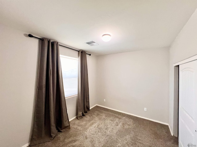 3431 W 39th Pl, Yuma, AZ 85365 - spare room featuring carpet flooring and baseboards