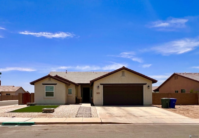 3431 W 39th Pl, Yuma, AZ 85365 - single story home featuring stucco siding, a garage, a tiled roof, and concrete driveway