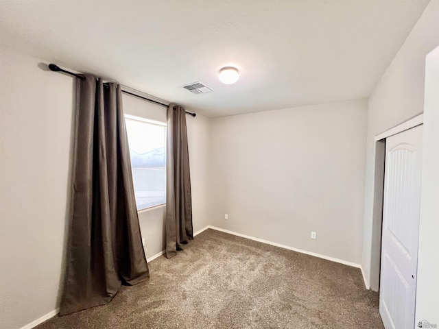3431 W 39th Pl, Yuma, AZ 85365 - unfurnished bedroom featuring carpet floors, baseboards, and a closet