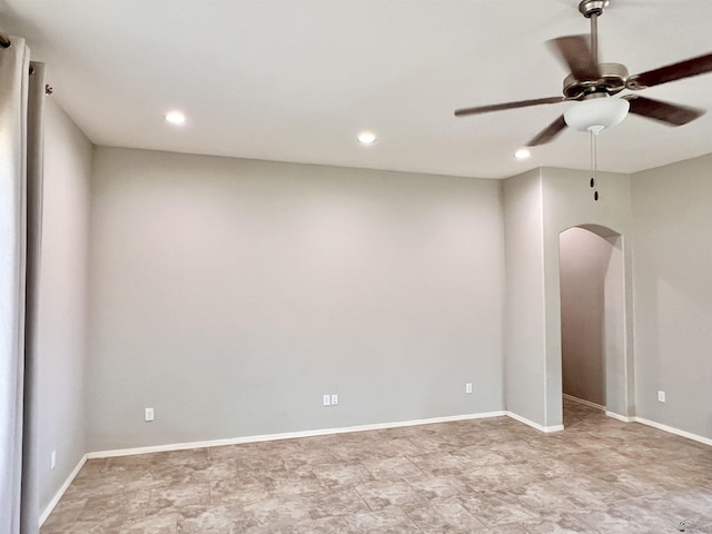 3431 W 39th Pl, Yuma, AZ 85365 - spare room with arched walkways, a ceiling fan, and recessed lighting