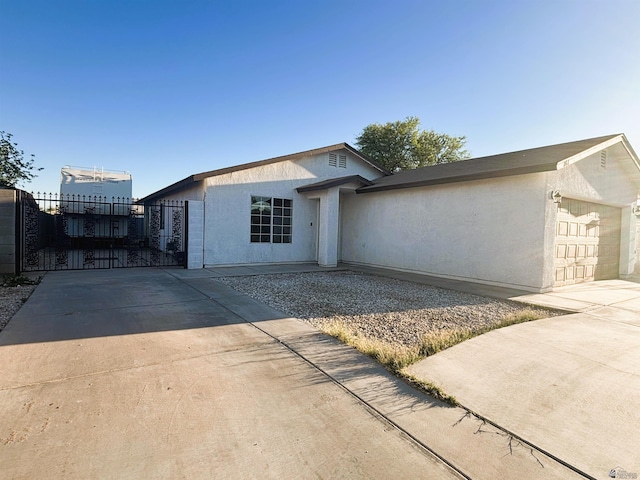 161 Las Praderas St, San Luis, AZ 85336 - single story home featuring a garage, fence, stucco siding, and concrete driveway
