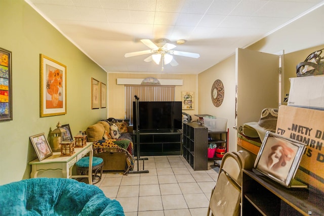 1180 E 26th Pl, Yuma, AZ 85365 - living room with a ceiling fan, light tile patterned flooring, and crown molding