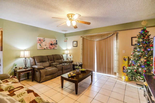1180 E 26th Pl, Yuma, AZ 85365 - living room with ceiling fan, light tile patterned flooring, and a textured ceiling