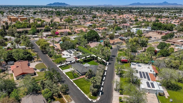 drone / aerial view with a residential view and a mountain view
