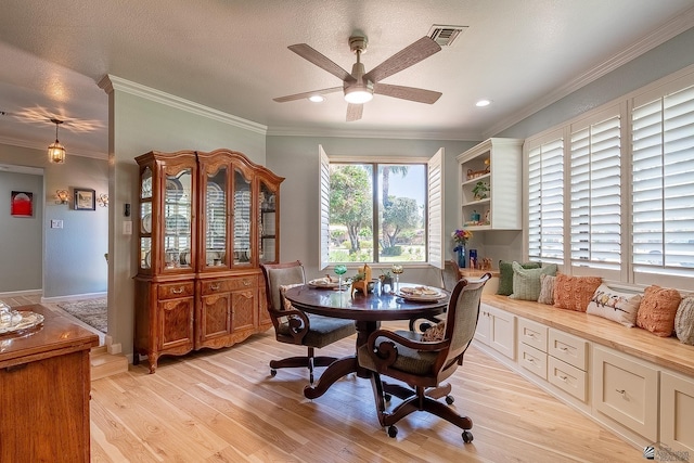 dining room featuring crown molding, visible vents, ceiling fan, recessed lighting, and light wood-type flooring