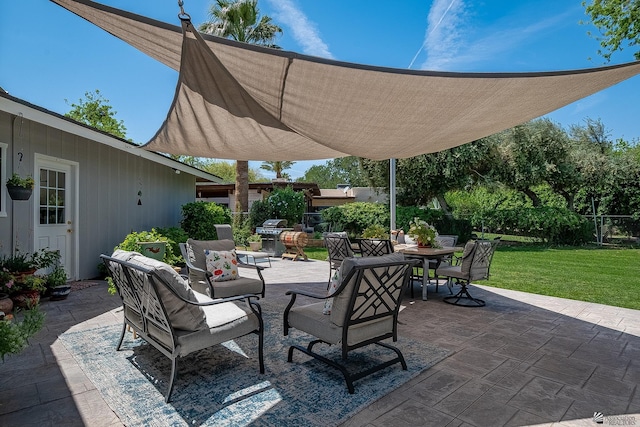view of patio featuring fence and outdoor dining space