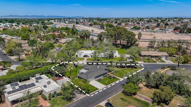 bird's eye view with a residential view and a mountain view