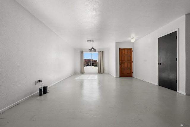 2045 S 14th Ave Unit 74, Yuma, AZ 85364 - unfurnished living room with concrete floors and baseboards
