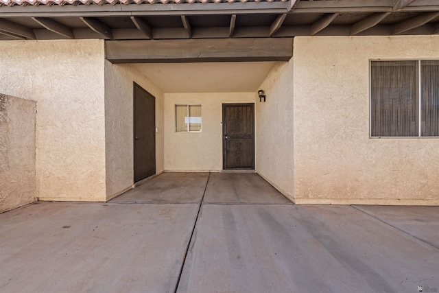 2045 S 14th Ave Unit 74, Yuma, AZ 85364 - property entrance with stucco siding and a patio area