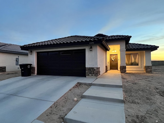 view of front of property featuring a garage