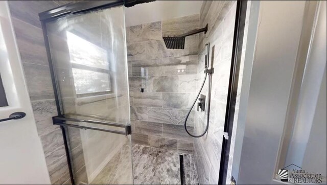 bathroom featuring walk in shower