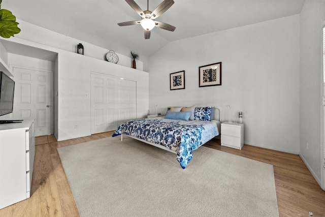 3875 W 26th St, Yuma, AZ 85364 - bedroom featuring vaulted ceiling, light wood finished floors, a ceiling fan, and a closet