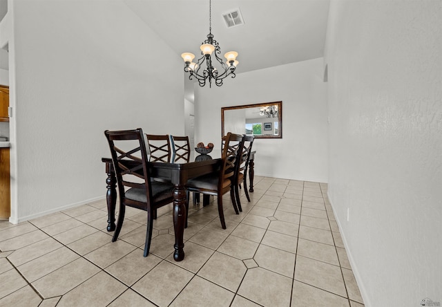 3875 W 26th St, Yuma, AZ 85364 - dining area with a chandelier, light tile patterned flooring, and lofted ceiling