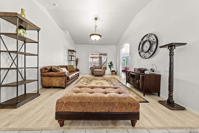 3875 W 26th St, Yuma, AZ 85364 - living room with wood finished floors, arched walkways, and high vaulted ceiling
