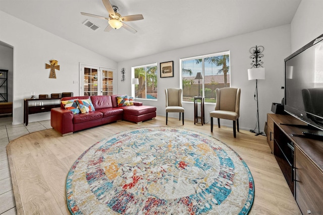 3875 W 26th St, Yuma, AZ 85364 - living room featuring ceiling fan, lofted ceiling, and light wood-style floors