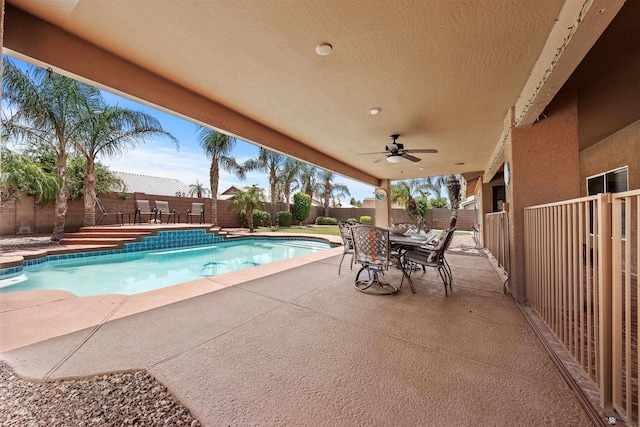 3875 W 26th St, Yuma, AZ 85364 - view of pool featuring a patio area, outdoor dining area, and a fenced backyard