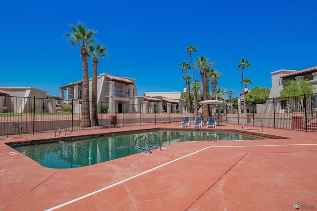 2231 S Elks Ln # 77, Yuma, AZ 85364 - community pool featuring a patio and a residential view