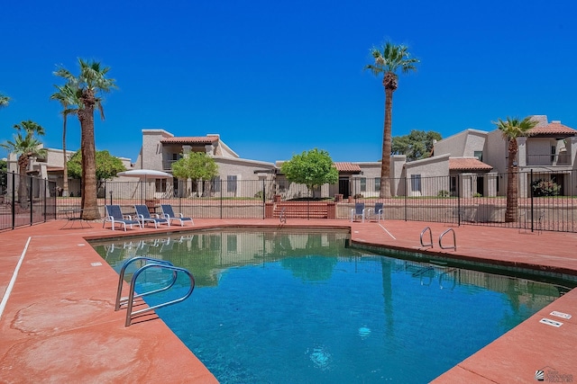 2231 S Elks Ln # 77, Yuma, AZ 85364 - community pool featuring a residential view and a patio area