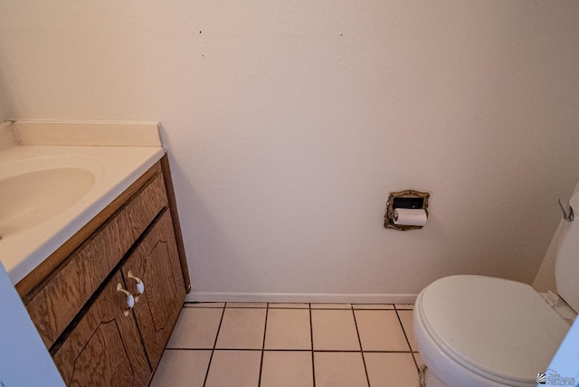2231 S Elks Ln # 77, Yuma, AZ 85364 - bathroom with vanity, toilet, baseboards, and tile patterned flooring