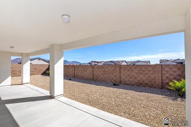 12653 E 51st Pl, Yuma, AZ 85367 - view of patio with a fenced backyard and a mountain view