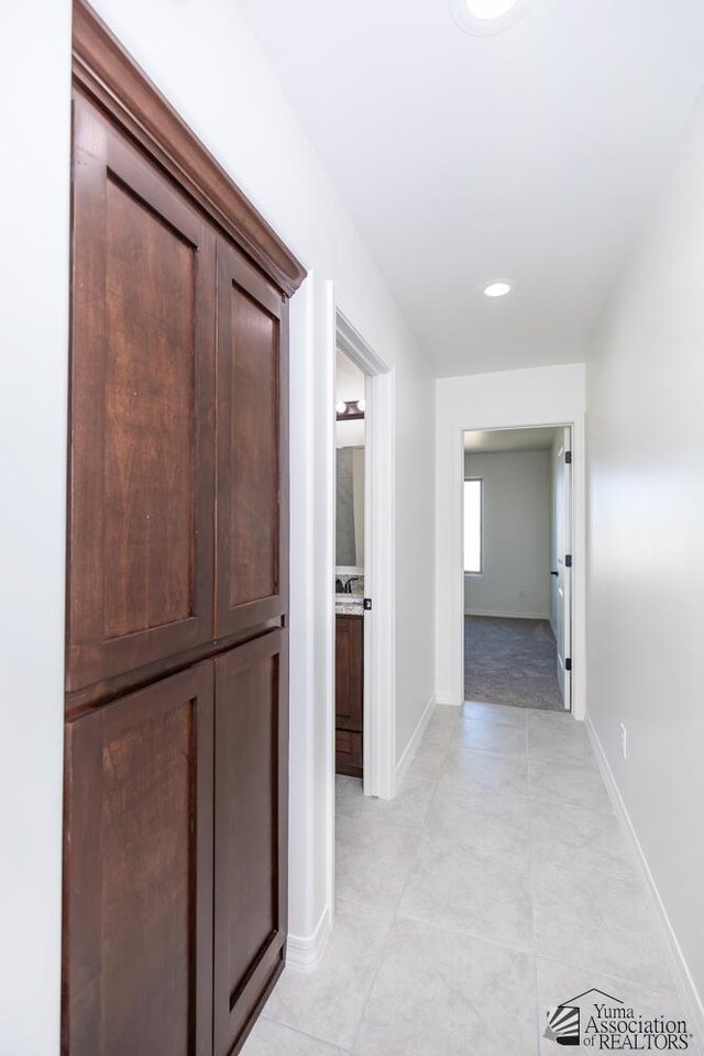 12653 E 51st Pl, Yuma, AZ 85367 - corridor with baseboards and light tile patterned floors