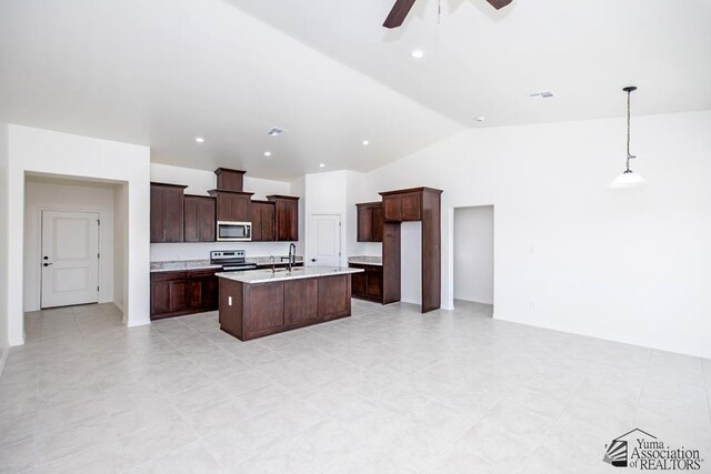 12653 E 51st Pl, Yuma, AZ 85367 - kitchen with appliances with stainless steel finishes, a sink, light countertops, a ceiling fan, and vaulted ceiling