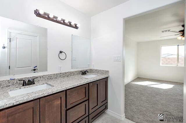 12653 E 51st Pl, Yuma, AZ 85367 - full bathroom featuring visible vents, a sink, ceiling fan, and double vanity