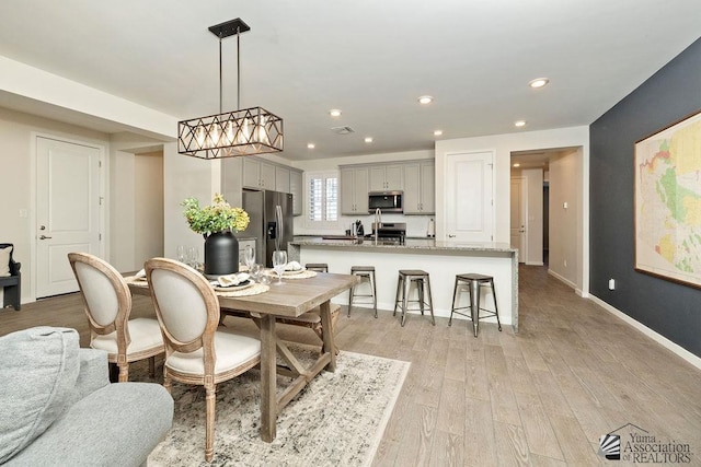 12160 S Drucilla Ln, Yuma, AZ 85367 - dining area featuring light wood finished floors and recessed lighting
