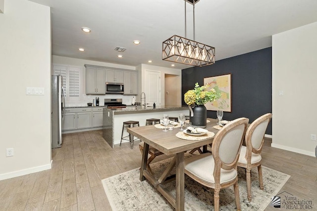 12160 S Drucilla Ln, Yuma, AZ 85367 - dining room with light wood-style floors and recessed lighting