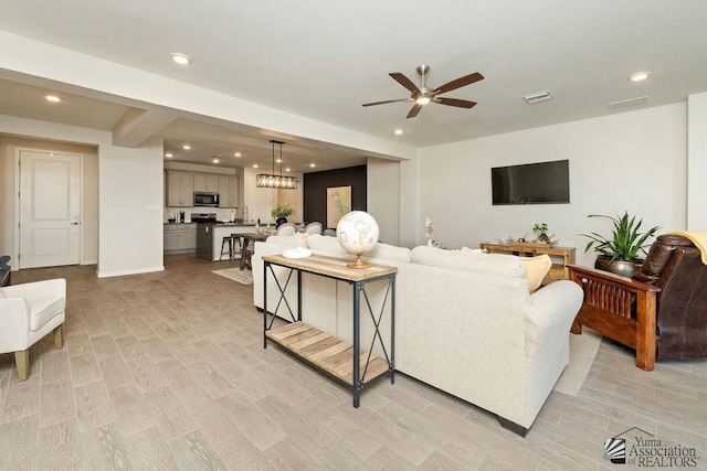 12160 S Drucilla Ln, Yuma, AZ 85367 - living area with ceiling fan, recessed lighting, and light wood-style flooring