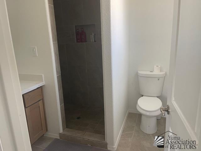4680 E San Pedro St, San Luis, AZ 85336 - full bathroom featuring a stall shower, tile patterned flooring, vanity, and toilet
