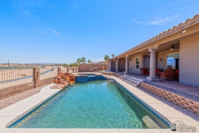 5492 E View Pkwy, Yuma, AZ 85365 - view of swimming pool with a fenced backyard, a ceiling fan, a patio area, and a pool with connected hot tub