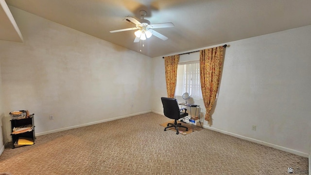 unfurnished office featuring carpet floors, ceiling fan, and baseboards