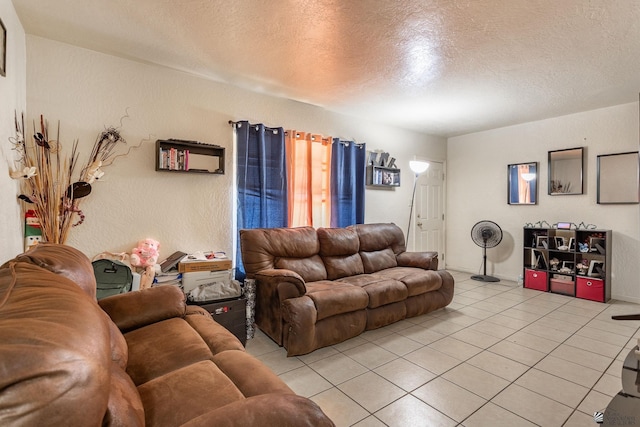 1127 S 13th Ave, Yuma, AZ 85364 - living area with light tile patterned flooring and a textured ceiling