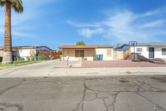 1127 S 13th Ave, Yuma, AZ 85364 - ranch-style house featuring stucco siding and driveway