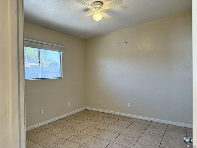 2741 S Fern Dr, Yuma, AZ 85364 - empty room with light tile patterned floors and a ceiling fan