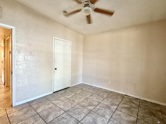 2741 S Fern Dr, Yuma, AZ 85364 - spare room featuring a ceiling fan and light tile patterned floors