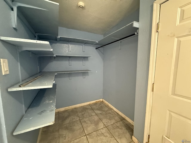 2741 S Fern Dr, Yuma, AZ 85364 - walk in closet with tile patterned floors