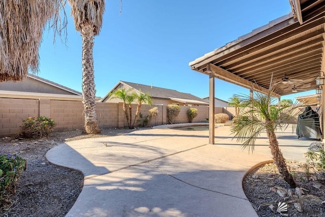 view of patio / terrace with a ceiling fan and a fenced backyard