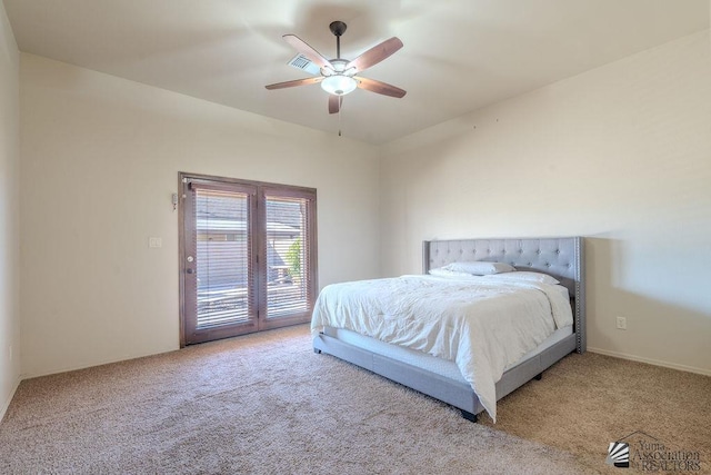 carpeted bedroom featuring access to outside and a ceiling fan