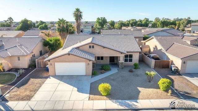 birds eye view of property with a residential view