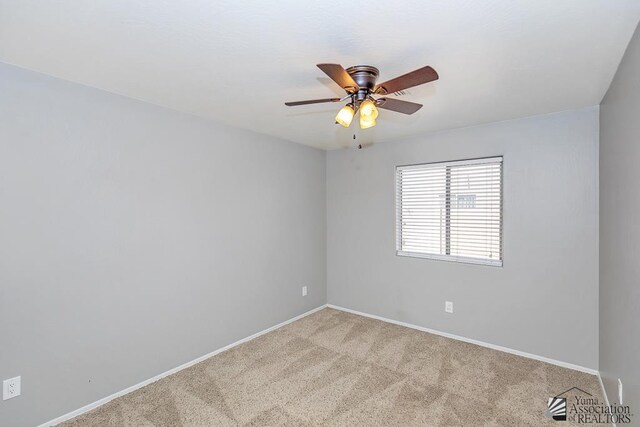 6257 E 47th St, Yuma, AZ 85365 - carpeted empty room featuring baseboards and ceiling fan