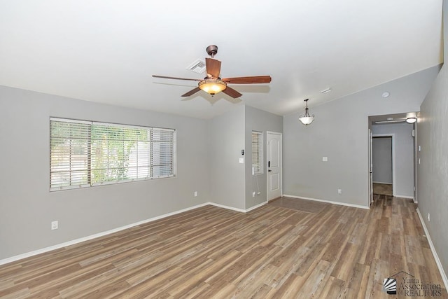 6257 E 47th St, Yuma, AZ 85365 - spare room featuring ceiling fan and light wood-style floors