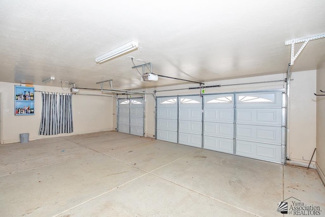6257 E 47th St, Yuma, AZ 85365 - garage featuring a garage door opener
