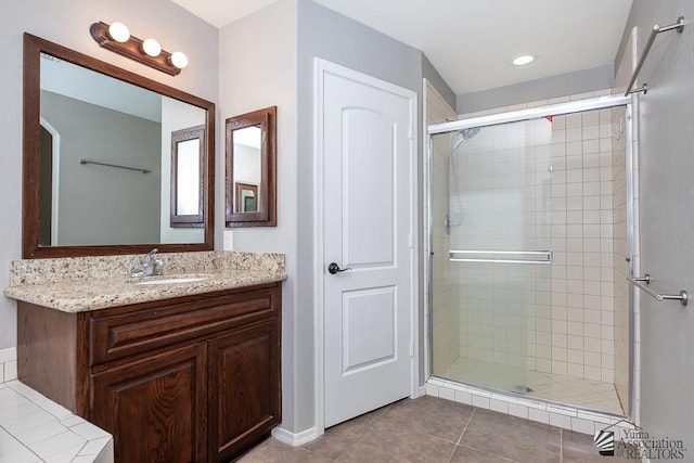 6257 E 47th St, Yuma, AZ 85365 - full bathroom featuring a stall shower, vanity, and tile patterned floors
