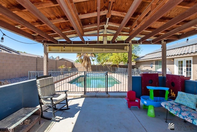 6257 E 47th St, Yuma, AZ 85365 - fenced backyard featuring a patio and french doors
