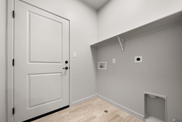 10770 E 45th Ln, Yuma, AZ 85367 - laundry area with washer hookup, hookup for an electric dryer, and wood finish floors