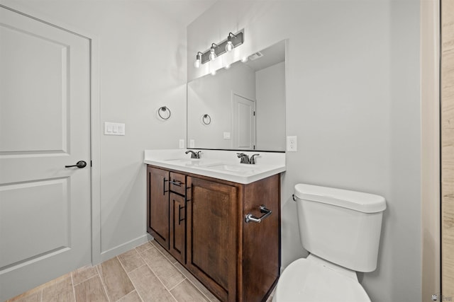 10770 E 45th Ln, Yuma, AZ 85367 - bathroom with double vanity and wood tiled floors