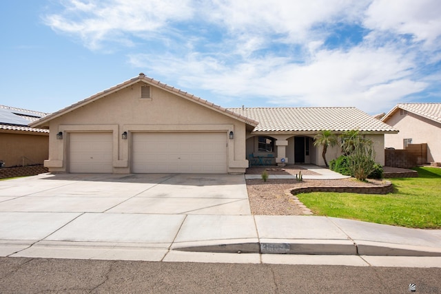 single story home with a porch, driveway, a tile roof, an attached garage, and stucco siding